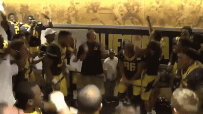 Football Players Dancing In Front Of California Sign GIF
