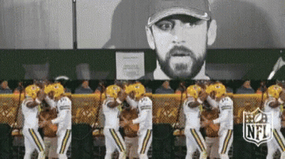 Football Players Dancing In Front Of Man Portrait GIF