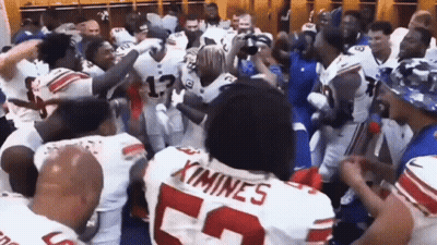 Football Players Dancing In Locker Room Number 25 GIF