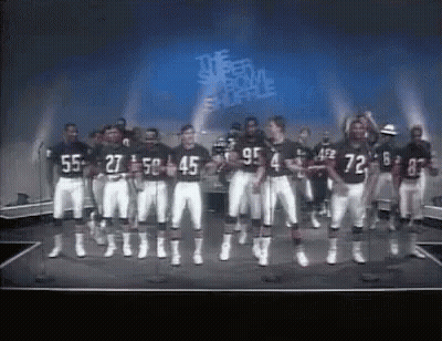 Football Players Dancing On Stage Saying It's A Wonderful Life GIF