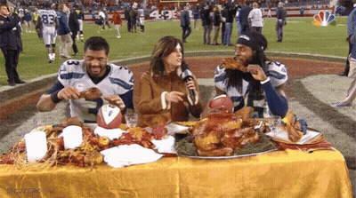 Football Players Eating Turkey GIF