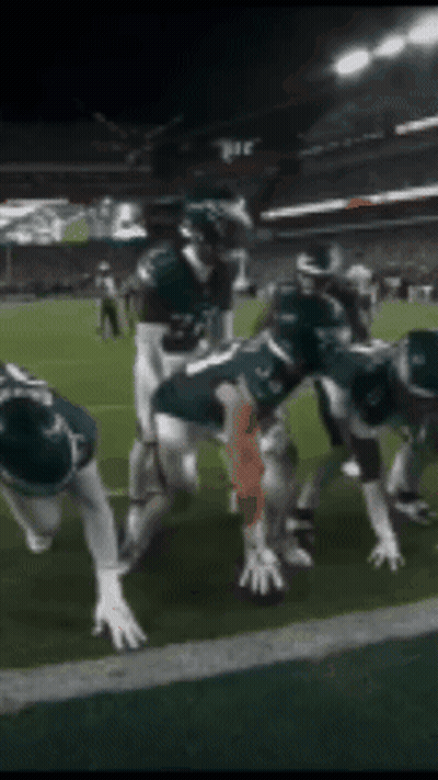 Football Players Getting Ready To Play GIF