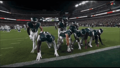 Football Players Getting Ready To Run GIF
