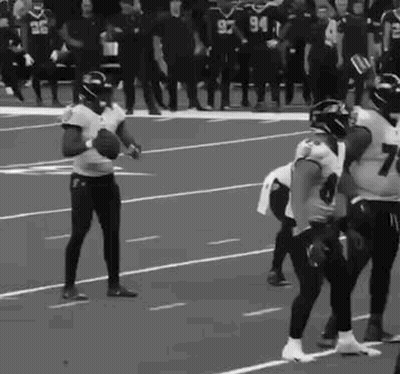 Football Players Holding Ball GIF