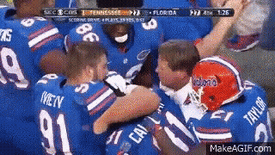 Football Players Hugging GIF