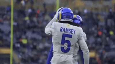 Football Players Hugging On Field GIF