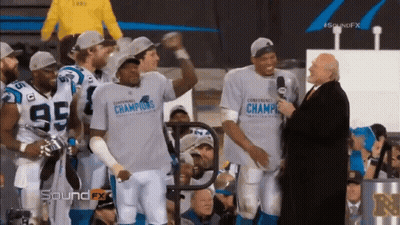 Football Players In Conference Champions Shirts GIF