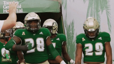 Football Players in Green Uniforms Number 28