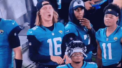 Football Players In Jerseys Number 16 And 11 GIF
