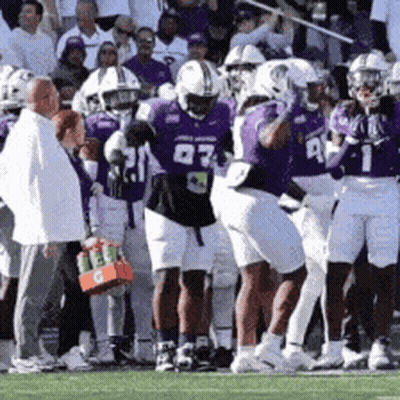 Football Players In Purple Jerseys Number 07 GIF
