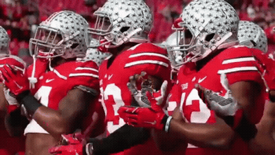 Football Players In Red And White Uniforms GIF