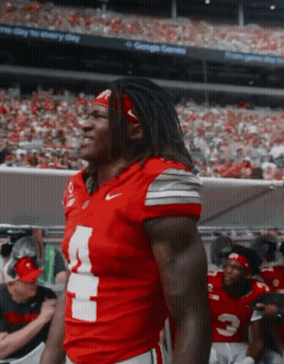 Football Players In Red Jerseys With Number 7 GIF
