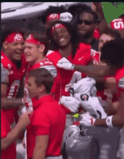 Football Players In Red Jerseys With Number 7 GIF