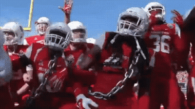 Football Players In Red Uniforms Number 36 GIF