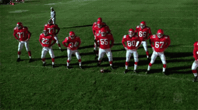 Football Players In Red Uniforms Number 55 GIF