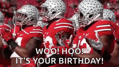 Football Players In Red Uniforms Standing In Line GIF