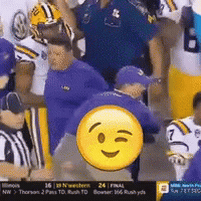 Football Players In Stadium With Smiley Face GIF