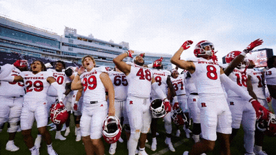 Football Players In White Uniforms With Letter R GIF