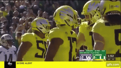 Football Players In Yellow Jerseys Number 5 GIF