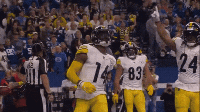 Football Players In Yellow Uniforms 14 And 83 GIF