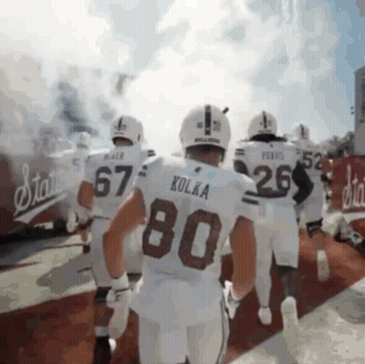 Football Players Including Kolka Number 80 GIF