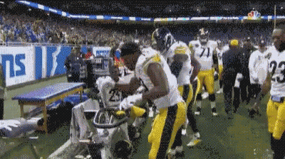 Football Players Including Number 65 And Reed GIF
