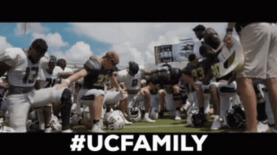 Football Players Kneeling In Huddle #UCFamily GIF