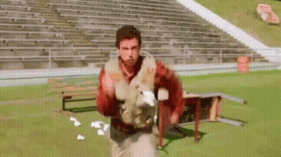 Football Players Lined Up On Field GIF