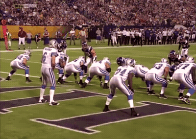 Football Players Lined Up With Letter T GIF