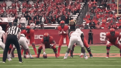 Football Players Lined Up With Referee GIF