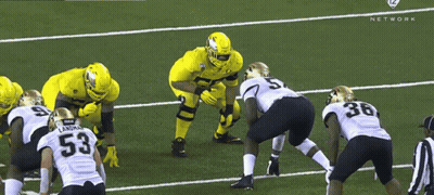 Football Players On Field Including Number 53 GIF