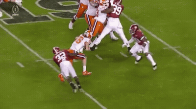 Football Players On Field One Kneeling GIF