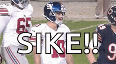 Football Players On Field One Wearing Helmet GIF