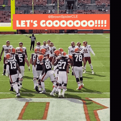 Football Players On Field Saying Let's Gooooo GIF