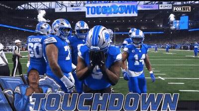 Football Players On Field Saying Touchdown GIF