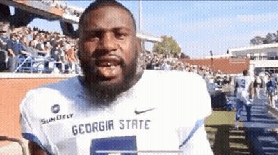 Football Players On Field With Crowd GIF