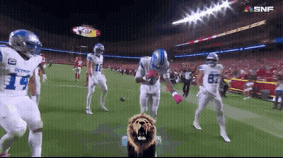 Football Players On Field With Number 14 Jersey GIF
