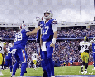 Football Players On Field With Number 17 GIF