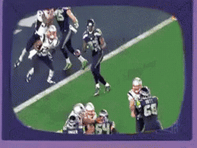 Football Players On Field With Number 64 GIF
