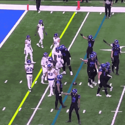Football Players On Field With Number 7 GIF