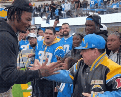 Football Players On Field With Number 83 Jersey GIF
