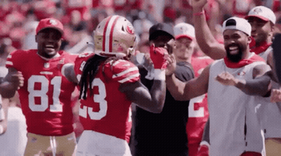 Football Players On Field With Number 83 Jersey GIF