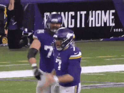 Football Players On Field With Reign It Home Sign GIF