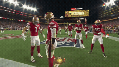 Football Players On Field With Touchdown Screen GIF
