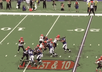 Football Players On Field With West & 10 Sign GIF