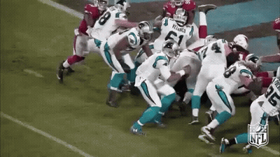 Football Players Playing Football On Field GIF