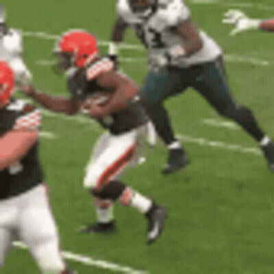 Football Players Playing Game On Field GIF