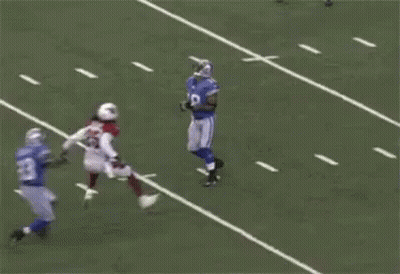 Football Players Playing Game With Referee GIF