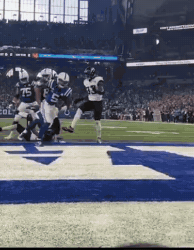 Football Players Playing On Field GIF