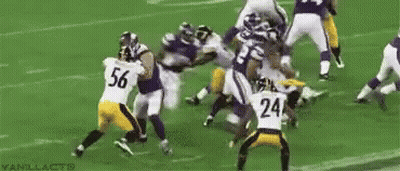 Football Players Playing On Field Number 63 GIF